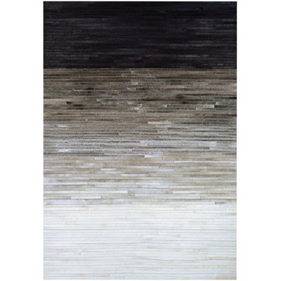 Tapis gris en laine de vache Ashlie