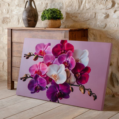 Toile, un arrangement vibrant de fleurs d'orchidées variées mettant en vedette un tableau d'art mural de couleurs, y compris l'art mural sur toile rose foncé