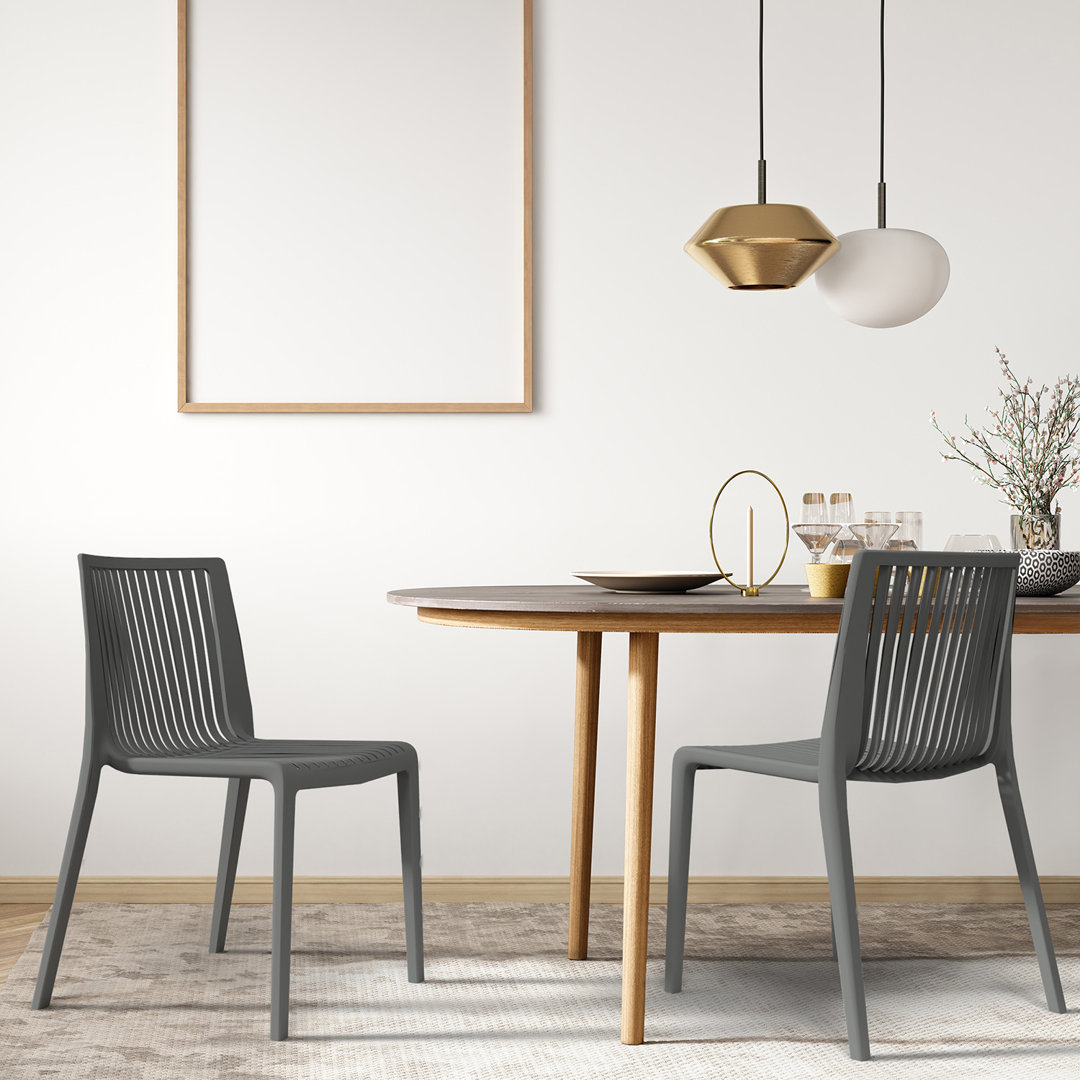 Oroklini Outdoor Stacking Dining Side Chair (Set of 2) Latitude Run® 