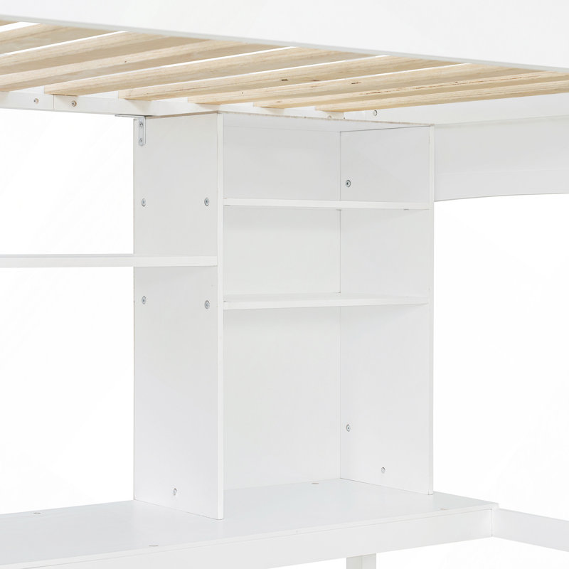 Lit mezzanine avec tablettes de rangement, bureau et échelle