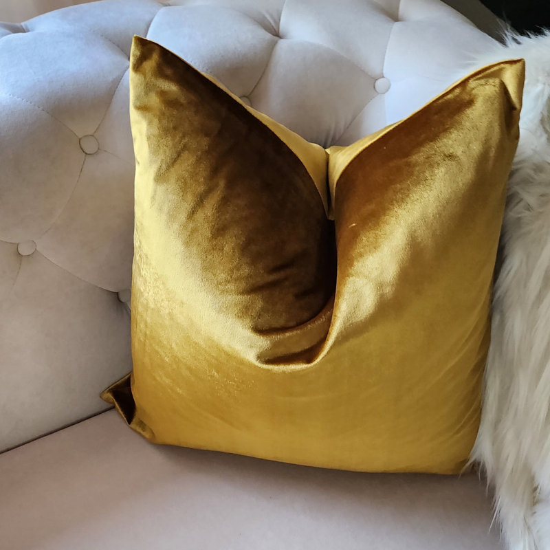 Housse de coussin en velours doré