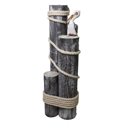 Souche Corriveau avec sculpture de pélican