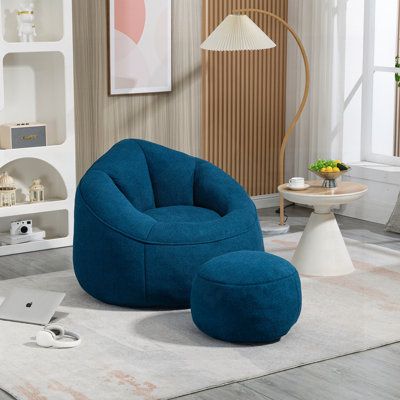 Fauteuil à billes en mousse haute pression avec repose-pieds rembourré, parfait pour le confort des adultes et la détente dans tout espace de vie.