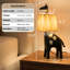Lampe de table à girafe moderne avec abat-jour en raphia tissé à la main, base en résine, 3 lumières à DEL intégrées-1184903116