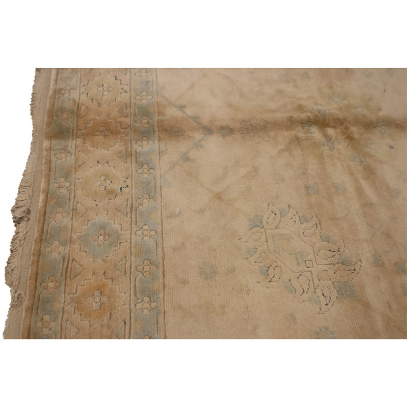 Tapis ivoire noué à la main de haute qualité