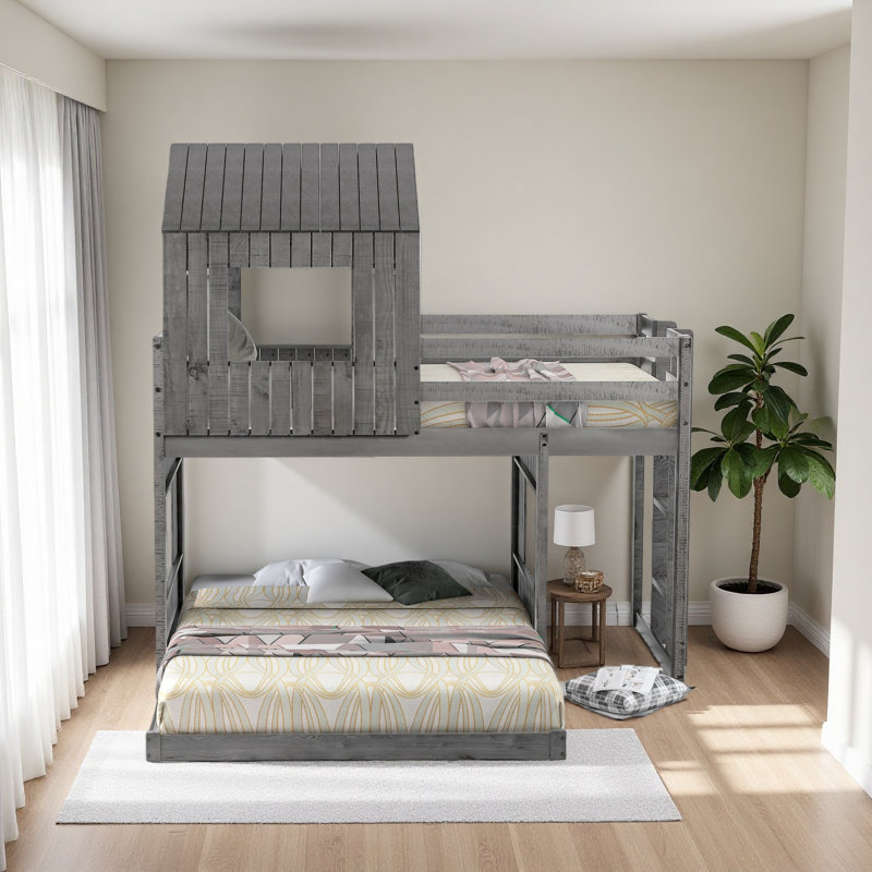 Lit superposé simple au dessus d'un lit double en bois