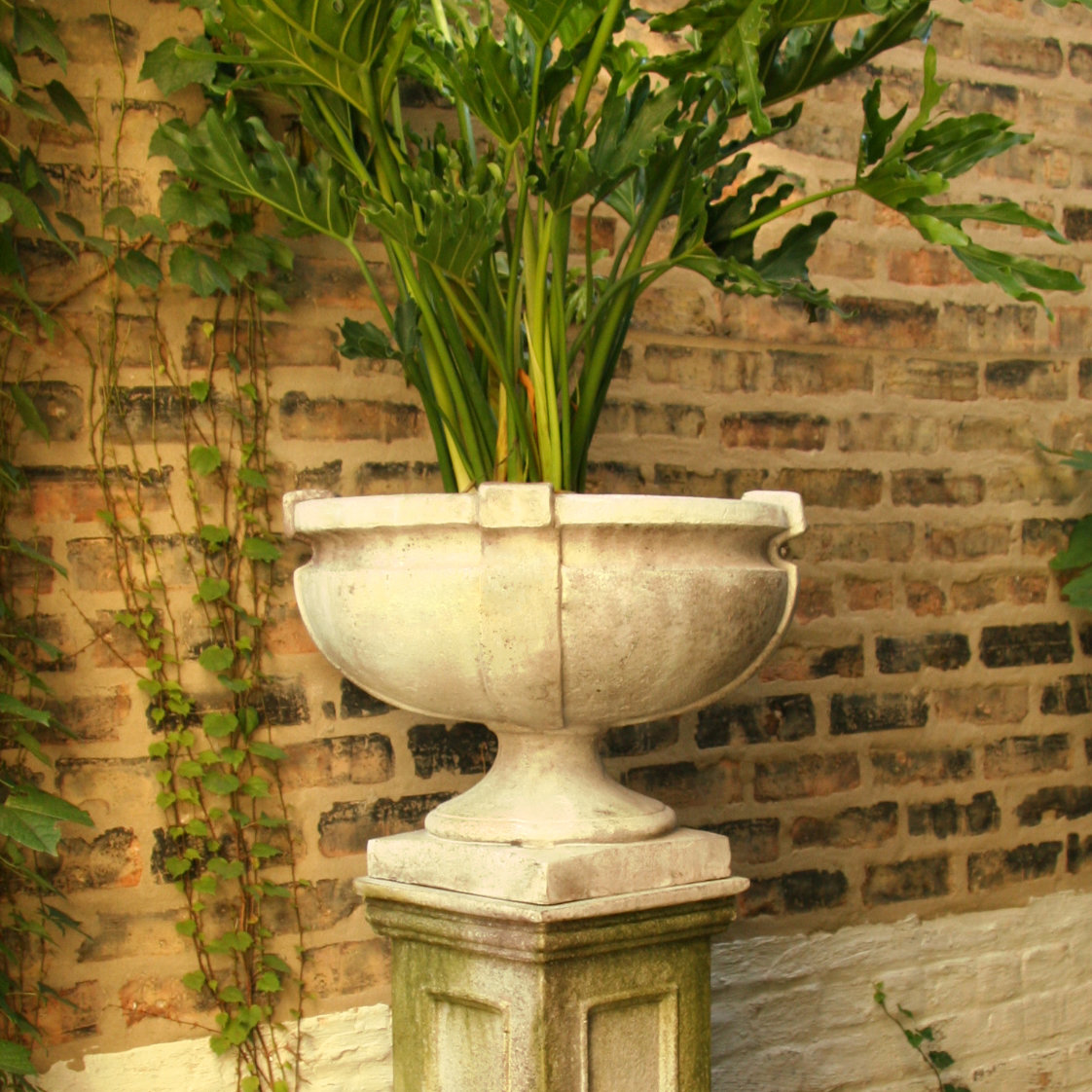 Fleur De Lis Living Rasco Fiberbtone Urn Planter & Reviews | Wayfair