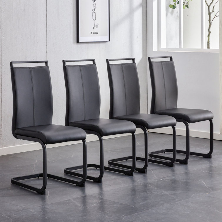 https://assets.wfcdn.com/im/19002932/resize-h755-w755%5Ecompr-r85/2627/262732616/Modern+Dining+Chair%2C+PU+Faux+Leather+High+Back+Upholstered+Side+Chair+With+C-Shaped+Tube+Black+Coating+Metal+Legs+For+Dining+Room+Kitchen+Vanity+Patio+Club+Guest+Office+Chair+%28Set+Of+4%29+Black%2BPU%2BFoam.jpg