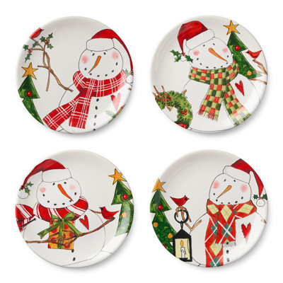 Snowman Delight Set of 4 Dessert Plates — Four assorted 9-inch ceramic plates in whimsical snowman vignettes, bringing winter wonderland warmth to every course of the holiday meal.