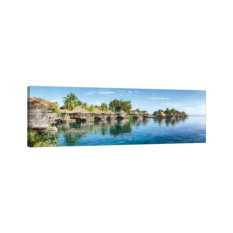 Overwater Bungalows At A Luxury Beach Resort On Moorea, French Polynesia by Jan Becke - Wrapped Canvas Panoramic Print