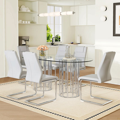 Ensemble de table et de chaises Table de salle à manger ovale en verre trempé de 71 pouces, double colonne argentée de style luxueux, chaises en polyuréthane gris clair avec pieds en métal arqués argentés, table moderne et ensemble de mobilier 6 places.