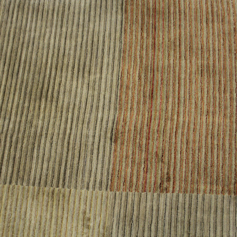 Wasif Area Rug in Brown