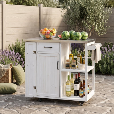 Chariot pour îlot de cuisine extérieur avec plan de travail en acier inoxydable, roues verrouillables, tiroir, armoire et tablettes ouvertes