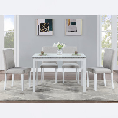 Kitchen Table Set with a Rectangular Table and 4 Upholstered Chairs