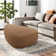 Adna 44'' Triangular Upholstered Ottoman