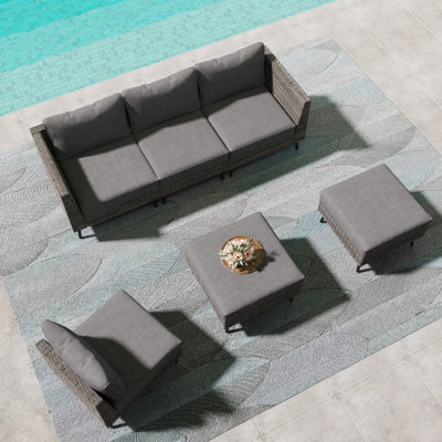 Gurshawn Wicker Sectional Seating Group with Cushions