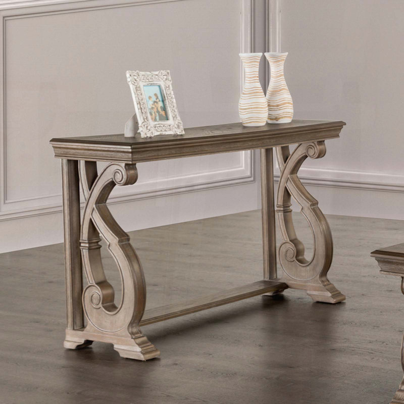 Table de canapé traditionnelle avec pieds à volutes sculptés et finition chêne vieilli