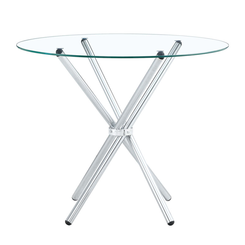 Table de salle à manger ronde en verre transparent avec pieds en métal argenté pour espaces modernes