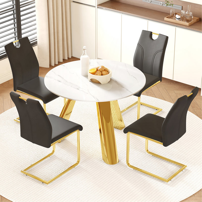 Ensemble de salle à manger moderne 42 po en pierre frittée de luxe avec base en métal doré et 4 chaises rembourrées en polyuréthane noir Elegant Contemporary