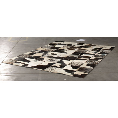 Teague Abstract Cowhide Area Rug