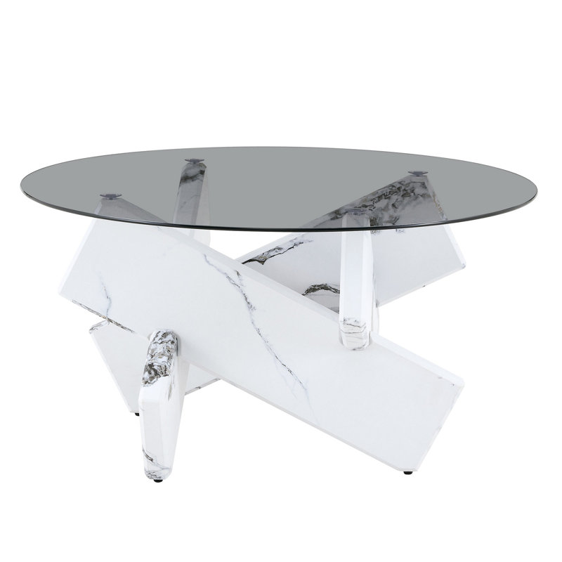 Table basse ronde artistique en forme de X. Verre trempé gris fumé + base en panneau de fibres à densité moyenne à motif de marbre bulgari blanc, table basse de salon luxueuse et légère.