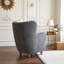 Fauteuil à oreilles avec pieds en bois massif et coussin à ressorts ensachés pour salon ou chambre