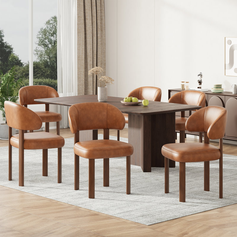 Chaises de salle à manger modernes rembourrées avec dossier incurvé et pieds en bois massif, Cuir brun-pu