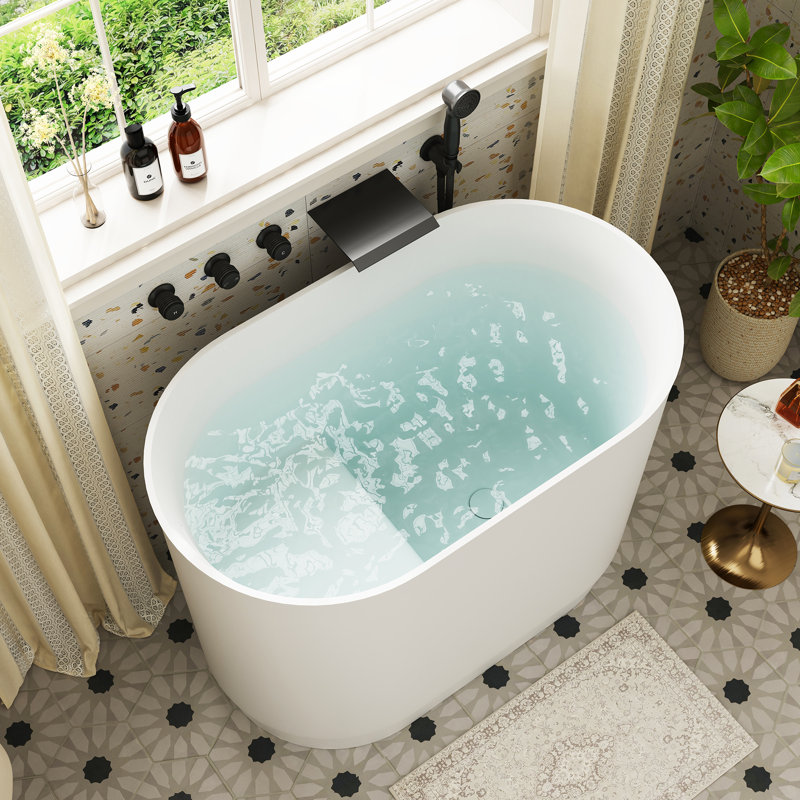 Baignoire de trempage autoportante à surface solide de 39 po avec siège intégré Casainc
