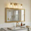 Lampe murale Lucy (verre transparent, laiton satiné)