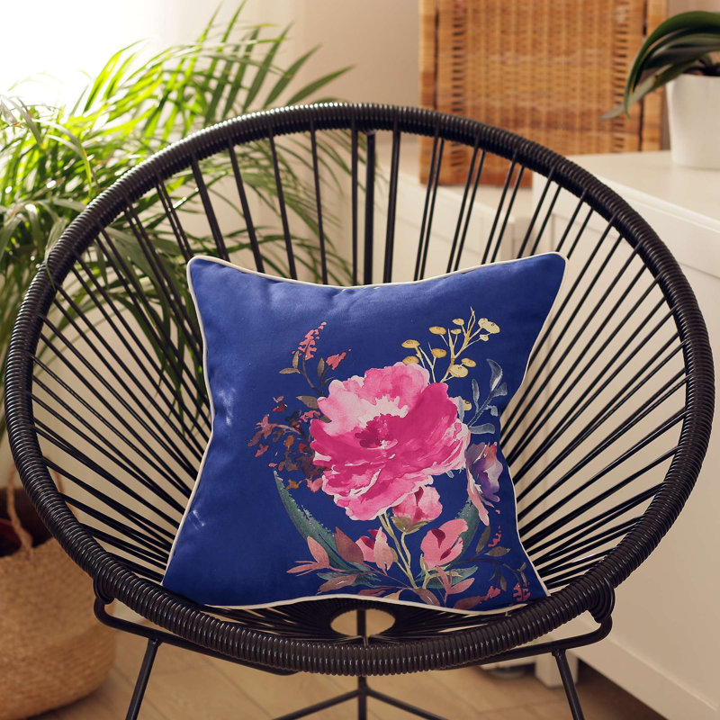 Coussin décoratif à imprimé floral bleu et rose