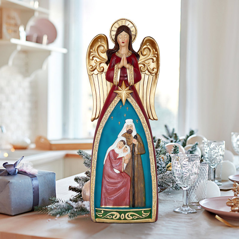 Statue d'ange de la crèche de Noël avec la Sainte Famille
