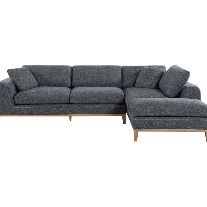 Canapé modulaire en L rembourré en forme de L avec un style Mid-Century, une finition de couleur grise, une base plateforme beige, des accoudoirs évasés, un dossier rembourré pour un espace de détente