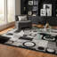 Tapis gris à motif abstrait Dillup-Jones-28940854