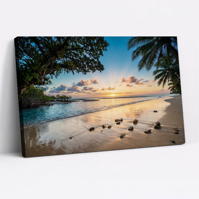 Tropical Beach Sunset with Palm Trees and Rocks Canvas Wall Art