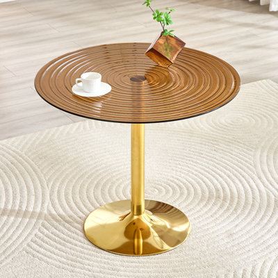 Table ronde en verre brun clair de luxe de 35 pouces de diamètre. Pilier en métal doré. Négociation, table basse, table de salle à manger. Convient aux petits espaces de salle à manger de 2 à 4 personnes.
