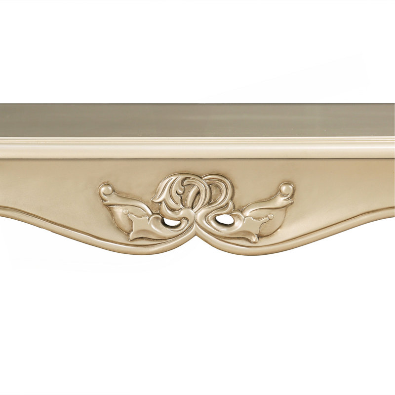 Table basse de style traditionnel avec pieds courbés et structure sculptée en bois massif finition champagne, Argent argent