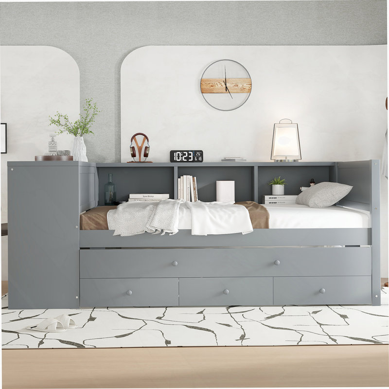 Lit de jour fonctionnel avec lit gigogne, tiroirs de rangement intégrés, tablettes latérales et bureau, idéal pour économiser de l'espace et une vie confortable