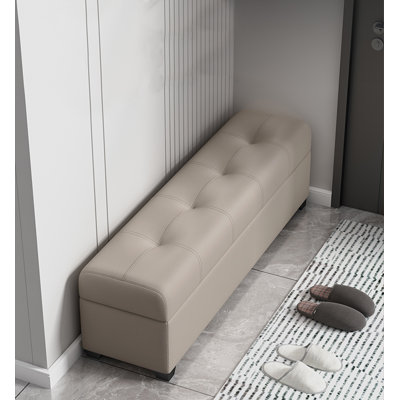 Repose-pieds en cuir massif avec rangement