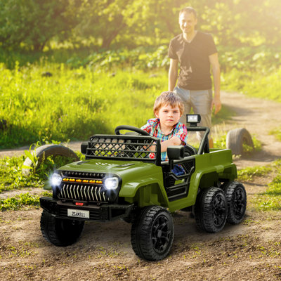 Voiture électrique Qabo 12V pour enfants, 4 roues motrices / 2 roues motrices avec télécommande, suspension à ressort, remorque arrière, éclairage DEL, musique, démarrage en douceur, klaxon, pendant 3 à 8 ans