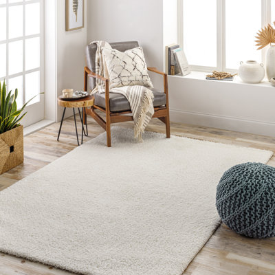 Tapis uni à poils longs