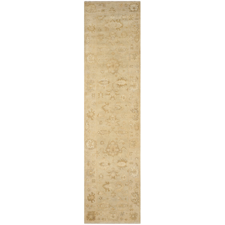 Langford Wool Oriental Area Rug in Brown/Beige