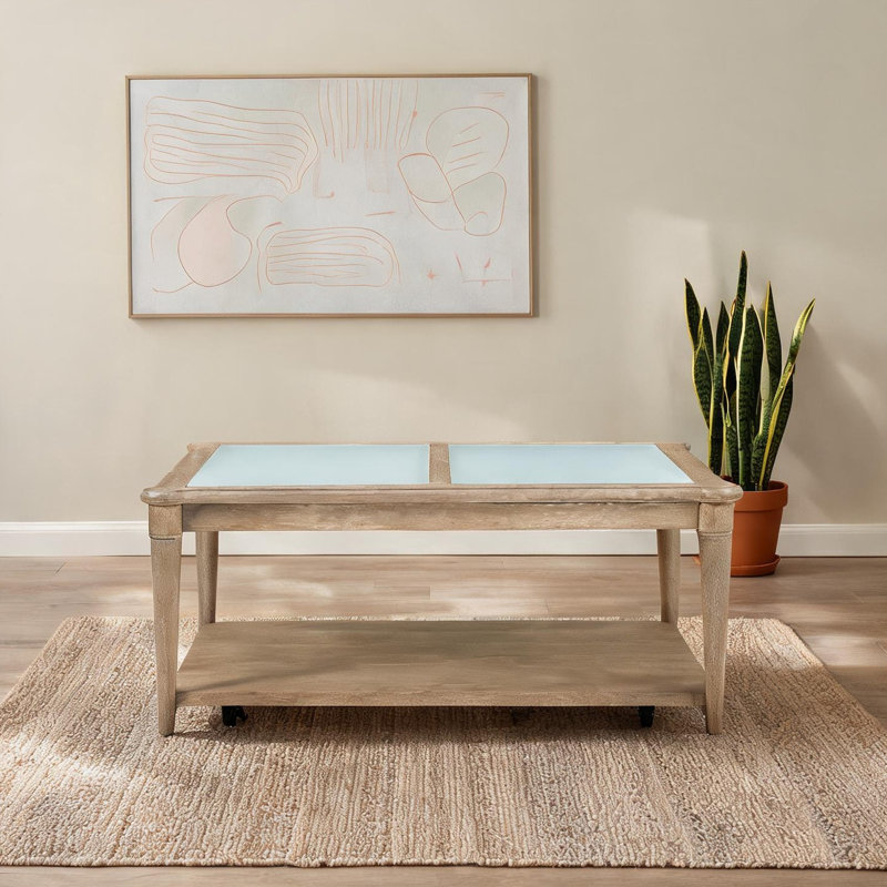 Table basse rectangulaire pour le salon, plateau en verre givré beige et bois massif, avec roulettes