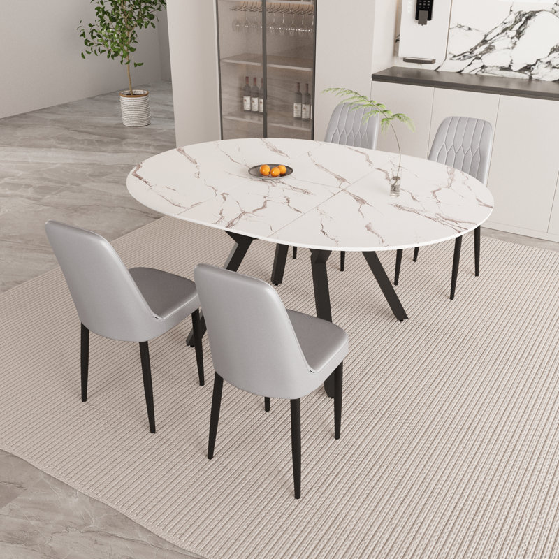 Tables de salle à manger extensibles de 47 à 63 po, équipées de 4 chaises de salle à manger rembourrées en tissu polyuréthane épais, d'une table de salle à manger, d'une table et d'une chaise élégantes et spacieuses, avec des pieds en métal noir