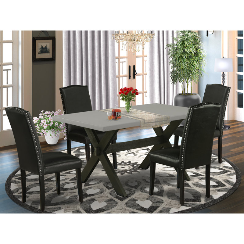 Ensemble de table de salle à manger 5 pièces comprenant une table de salle à manger rectangulaire avec pieds en X et 4 chaises Parsons en similicuir noir, noir brossé