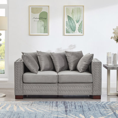 Causeuse rembourrée en velours Living