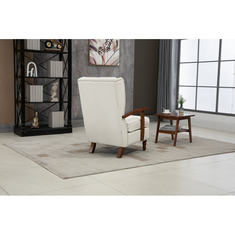 Fauteuil à oreilles rembourré Biali, Lin beige