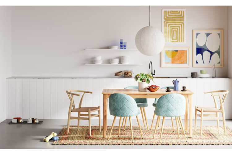 modern dining room with a trio of abstract wall art