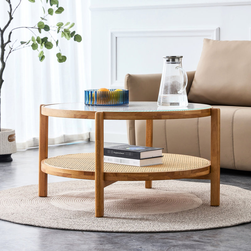 Table à thé simple en bois massif avec couche inférieure tissée et côté rond moderne en verre transparent