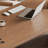 Cream-colored solid wood desk with a simple design