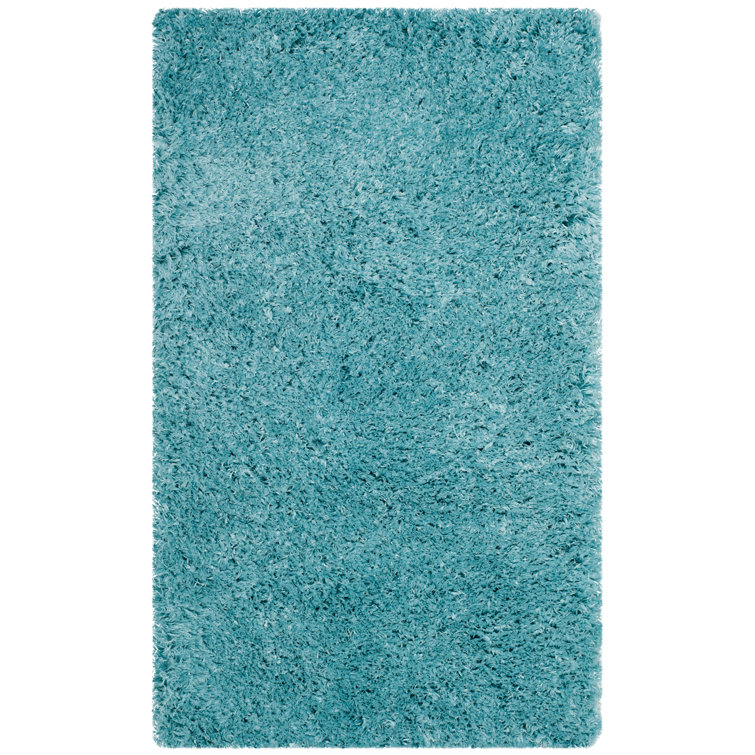 Hermina Light Turquoise Area Rug